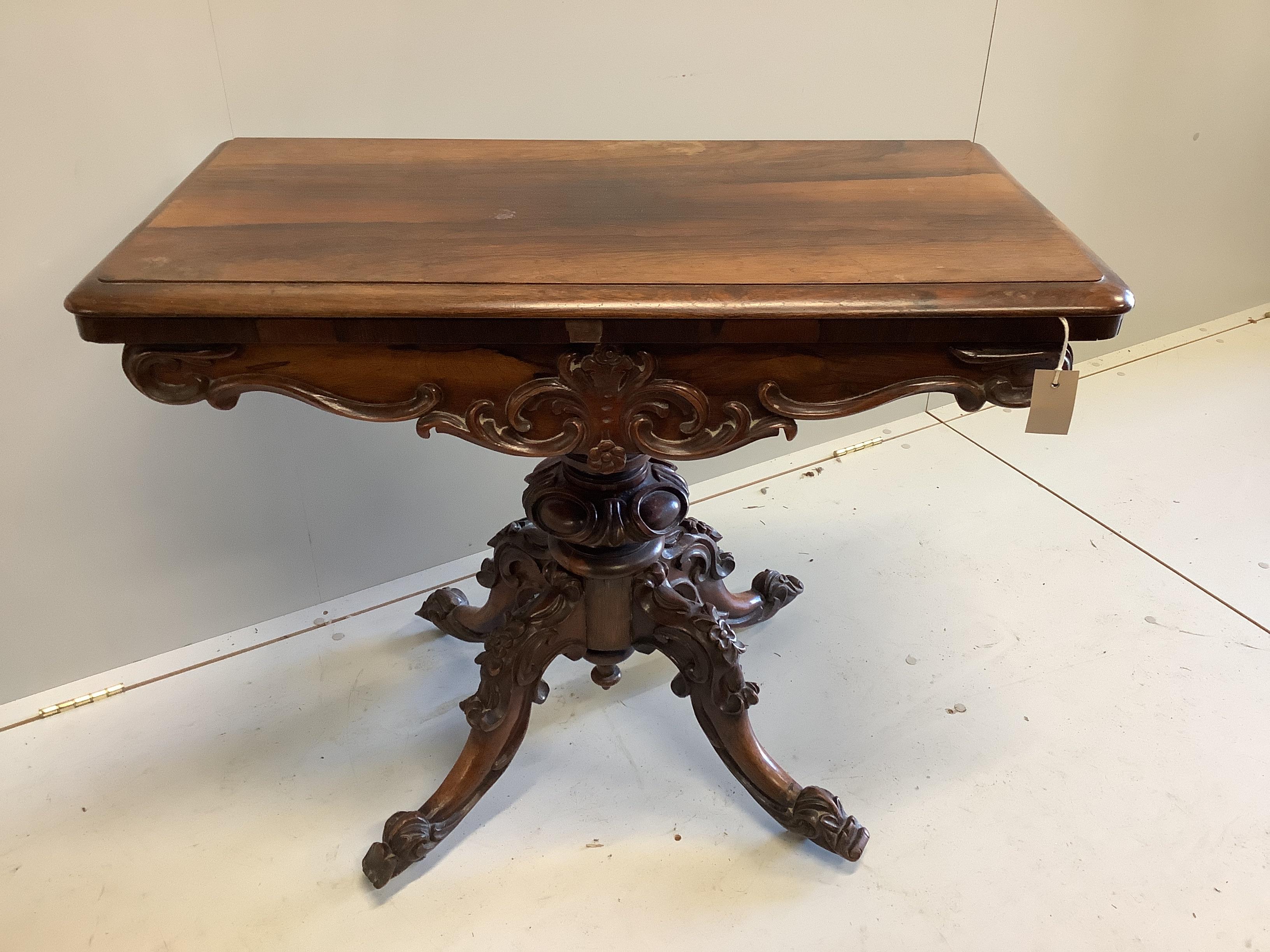 An early Victorian rosewood rectangular folding card table, width 89cm, depth 46cm, height 75cm